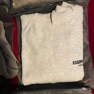 Essentials Light Gray Crew Sweatshirt with Small Black Logo